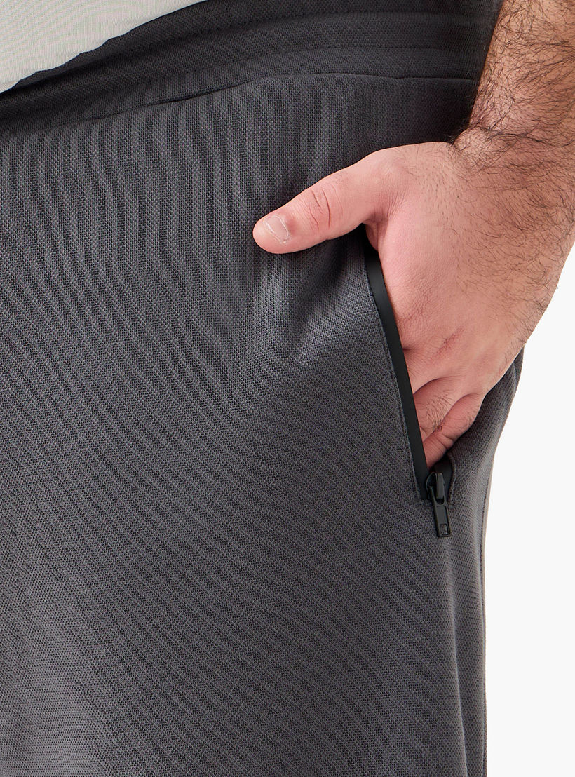 بنطلون رياضي بقصّة عادية وتفاصيل مغايرة للرجال-men-clothing-bottoms-joggers-image-4