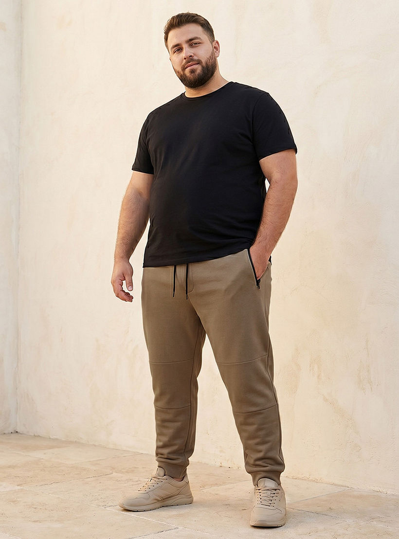بنطلون رياضي بقصّة مريحة ورباط إغلاق وتفاصيل مقصوصة ومخيطة للرجال-men-clothing-bottoms-joggers-image-3