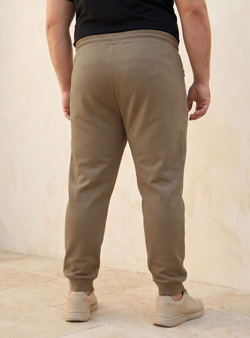 بنطلون رياضي بقصّة مريحة ورباط إغلاق وتفاصيل مقصوصة ومخيطة للرجال-men-clothing-bottoms-joggers-image-4