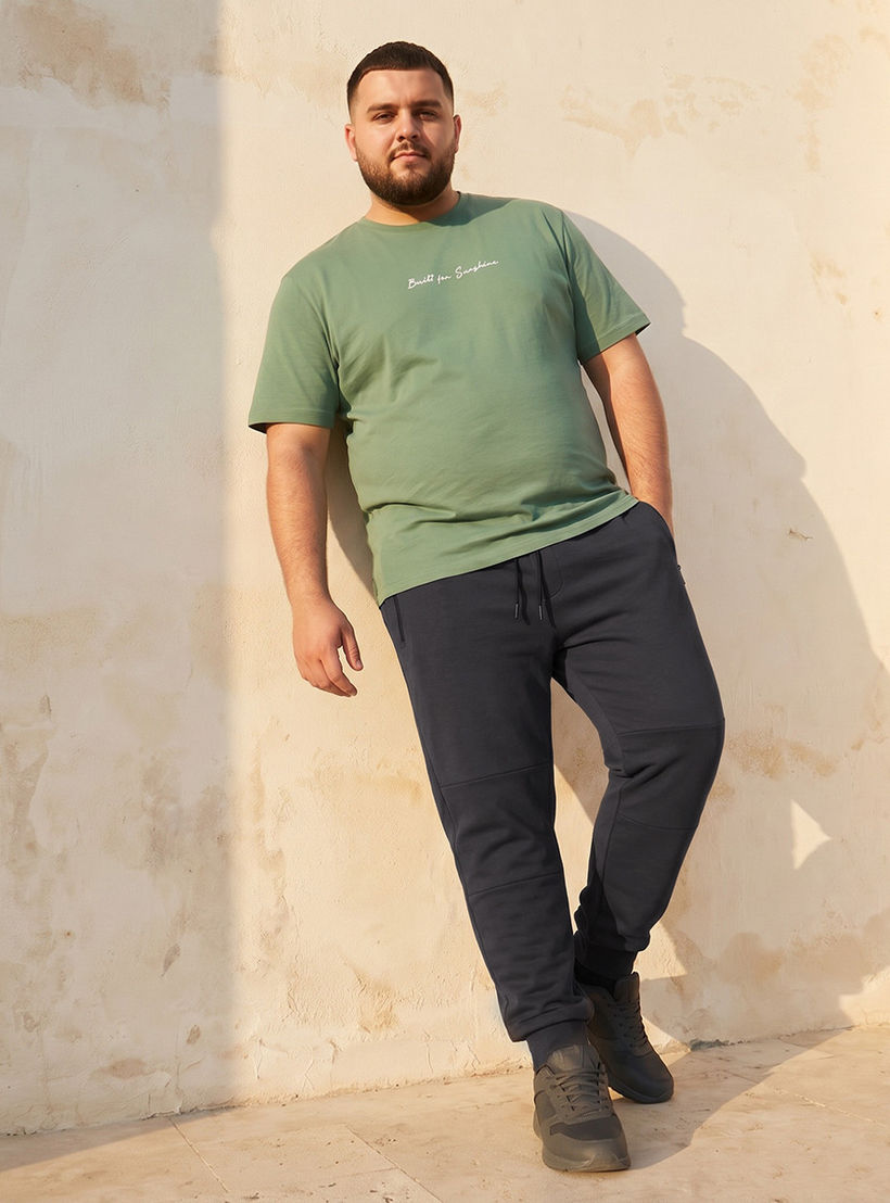 بنطلون رياضي بقصّة مريحة ورباط إغلاق وتفاصيل مقصوصة ومخيطة للرجال-men-clothing-bottoms-joggers-image-3