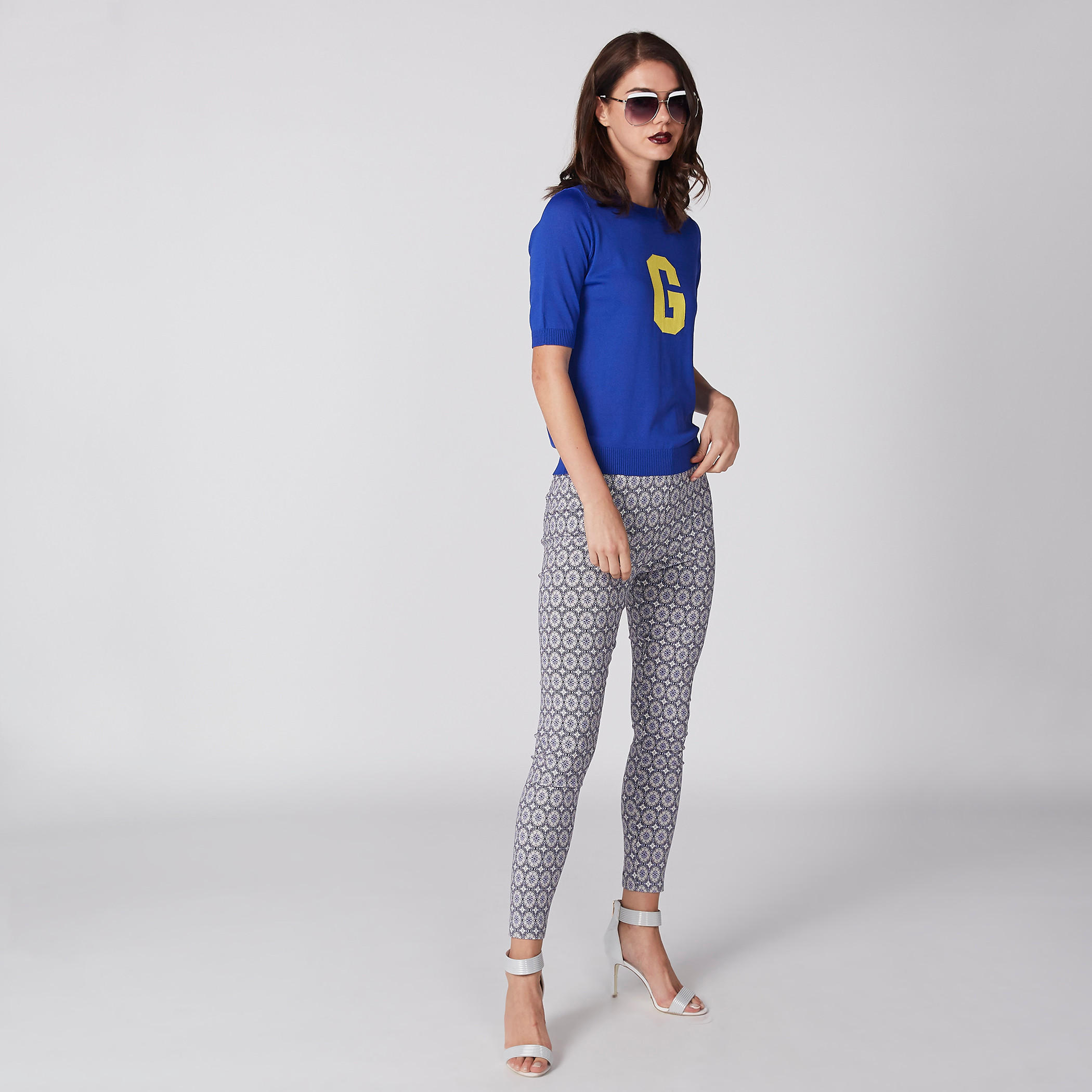 بنطال ليقنز طويل بطبعات وخصر مطاطي-women-clothing-bottoms-leggings-image-1