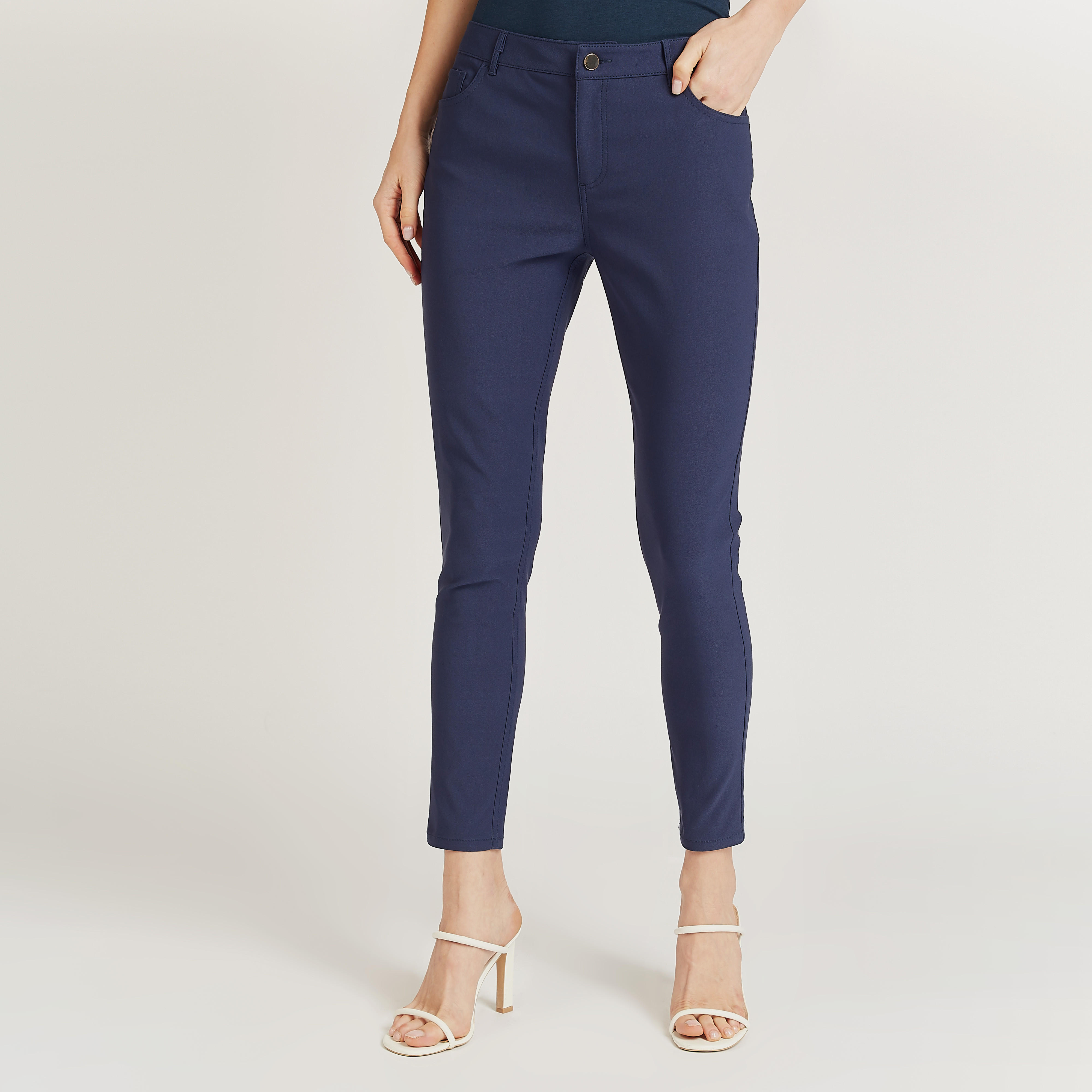 بنطلون تريقنز ميدي سليم سادة بخصر متوسط الارتفاع وعراوي وتفاصيل جيوب-women-clothing-bottoms-trousers-image-9