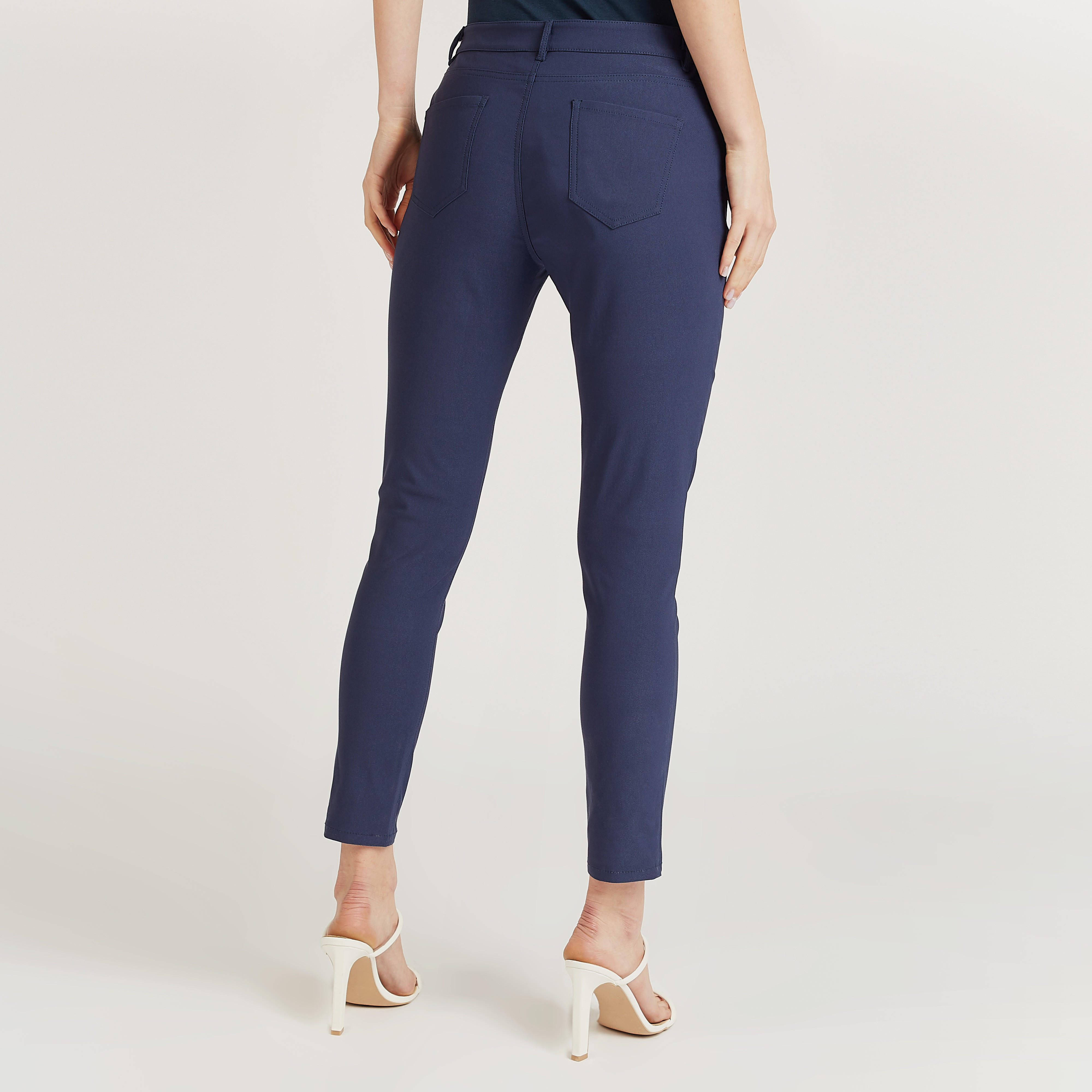 بنطلون تريقنز ميدي سليم سادة بخصر متوسط الارتفاع وعراوي وتفاصيل جيوب-women-clothing-bottoms-trousers-image-12