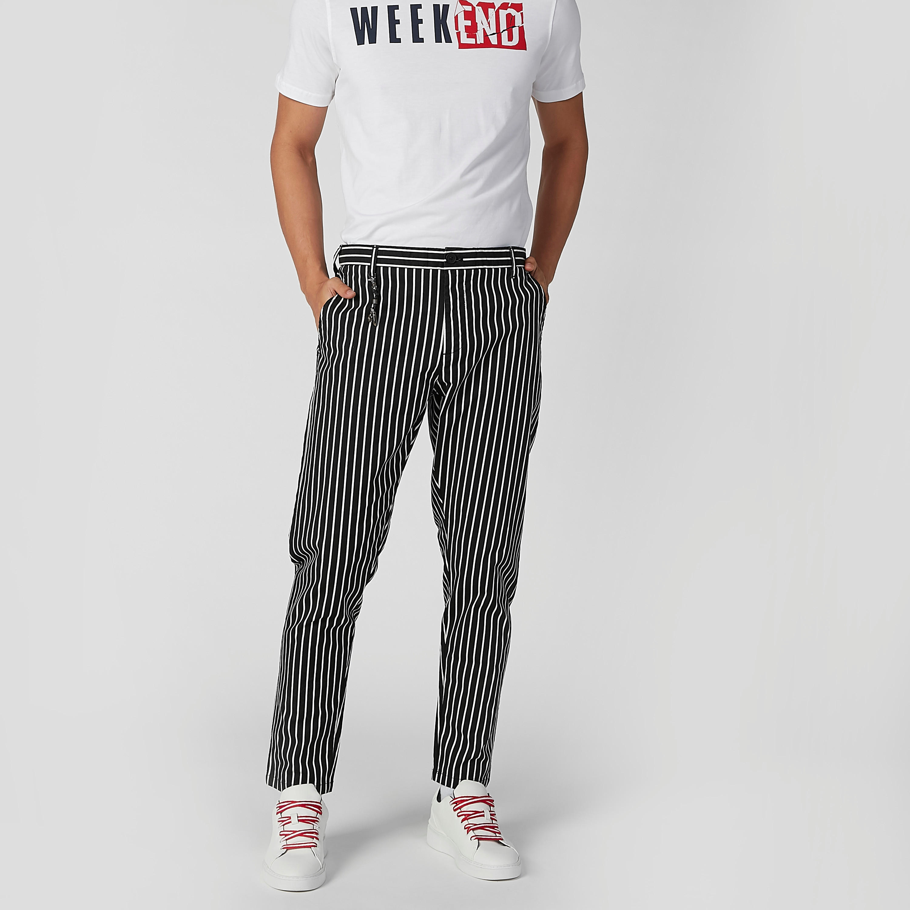 بنطال شينو مقلّم بقصة سليم وخصر متوسط الطول وجيوب جانبية-men-clothing-bottoms-trousersandchinos-trousers-image-5