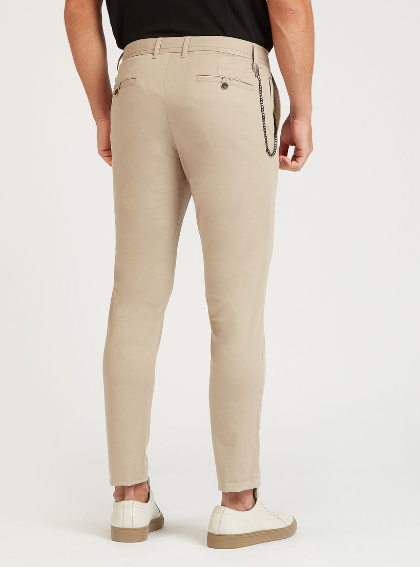بنطلون شينو بارز الملمس طويل بقصّة سليم وخصر متوسط الارتفاع وجيوب-men-clothing-bottoms-trousersandchinos-trousers-image-4