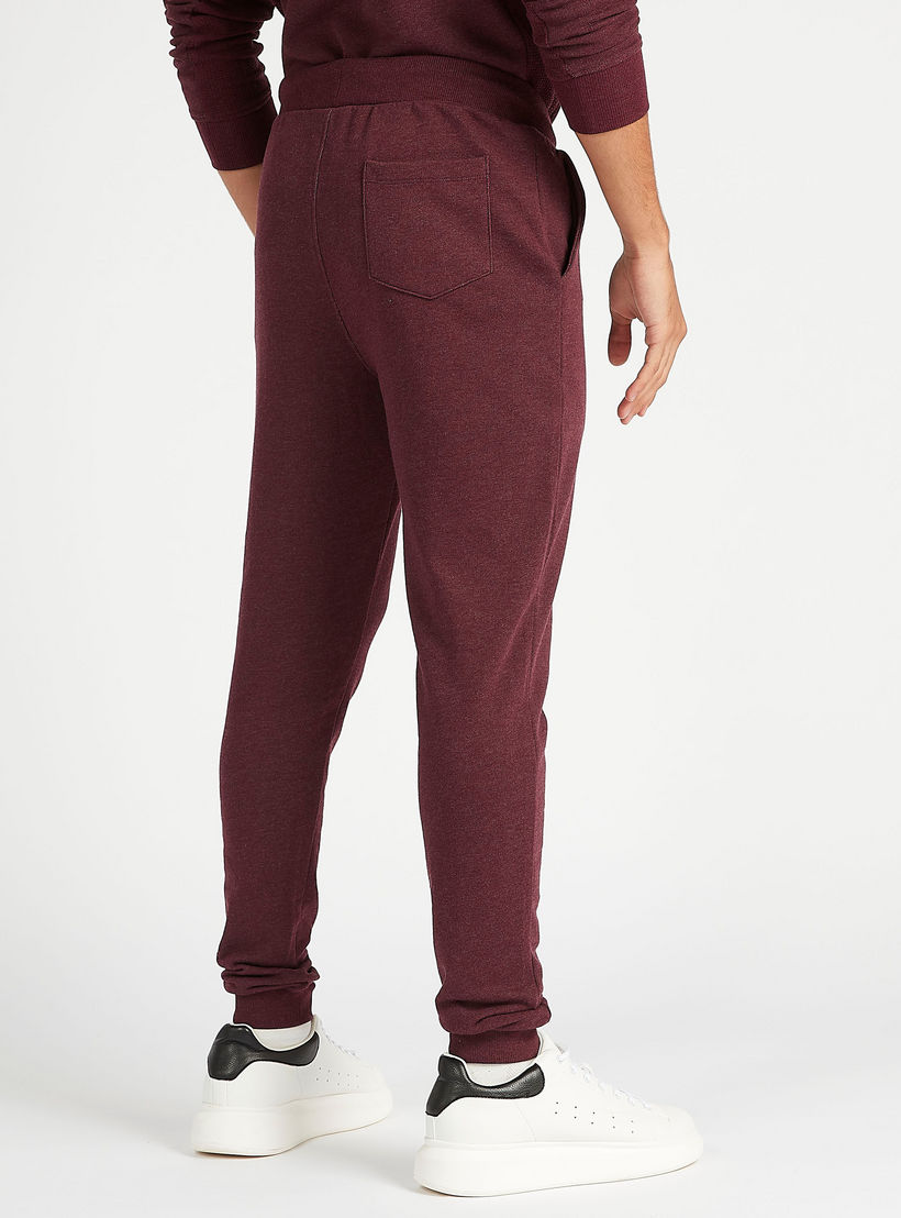 بنطلون رياضي مستدام سادة برباط إغلاق وخصر متوسّط الارتفاع-men-clothing-bottoms-joggers-image-1