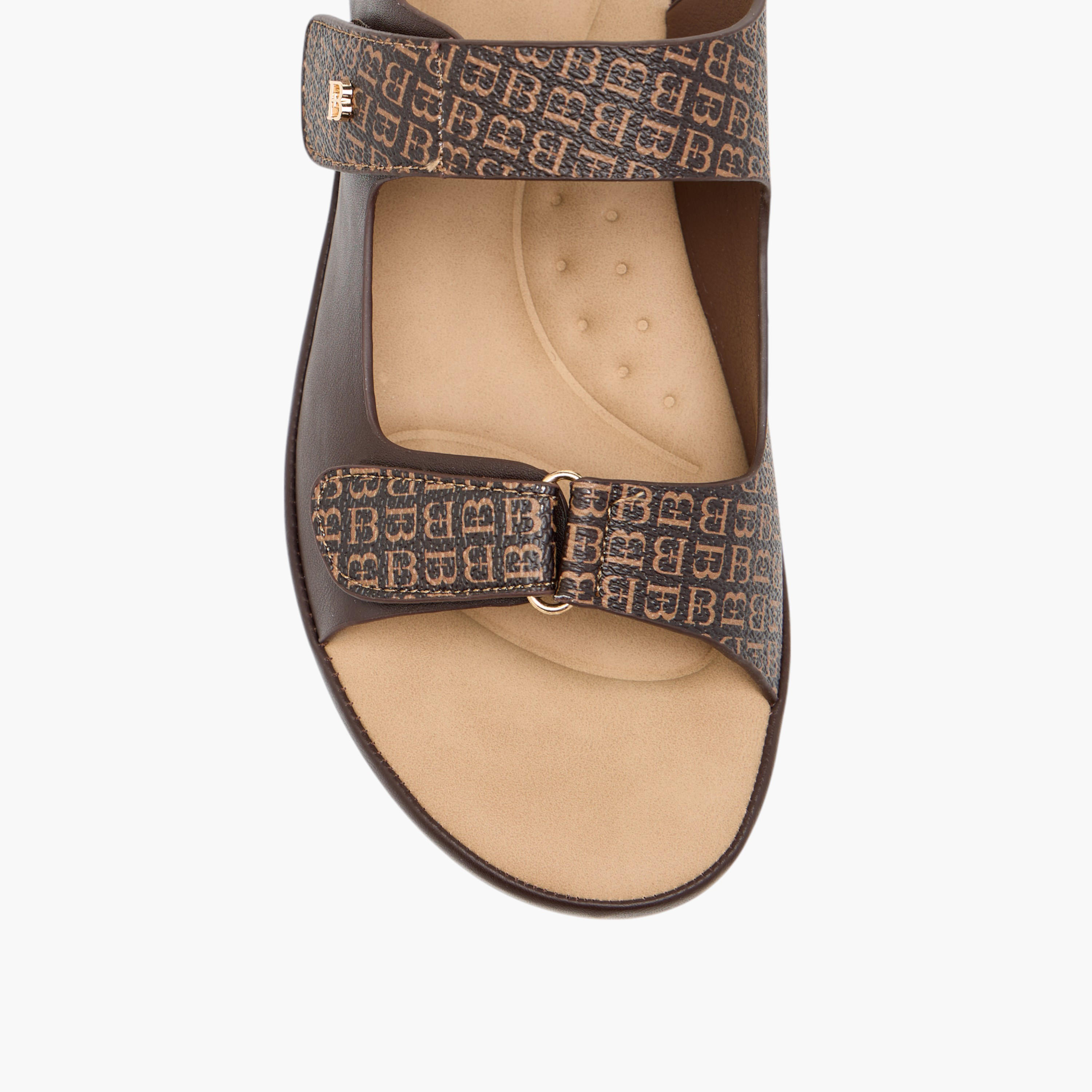 صندل بطبعات مونوجرام وشريط إغلاق لاصق من فلورا بيلا-women-shoes-flats-sandals-image-3