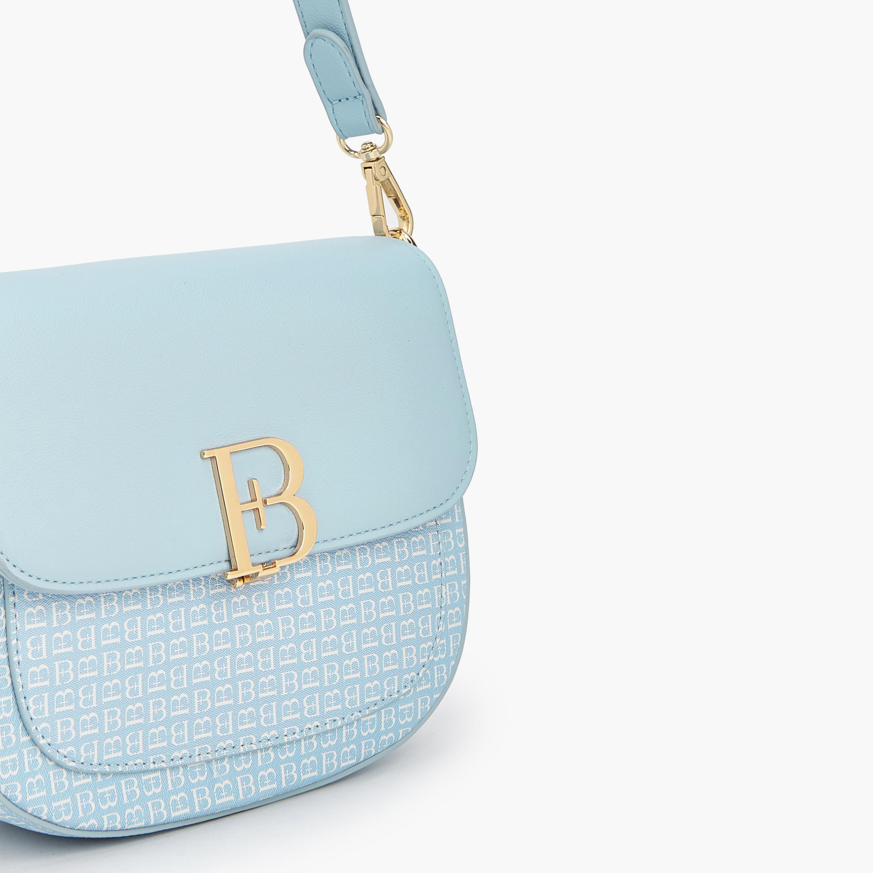 شنطة كتف بطبعات مونوجرام وطية من فلورا بيلا-women-bagsandwallets-handbags-image-4