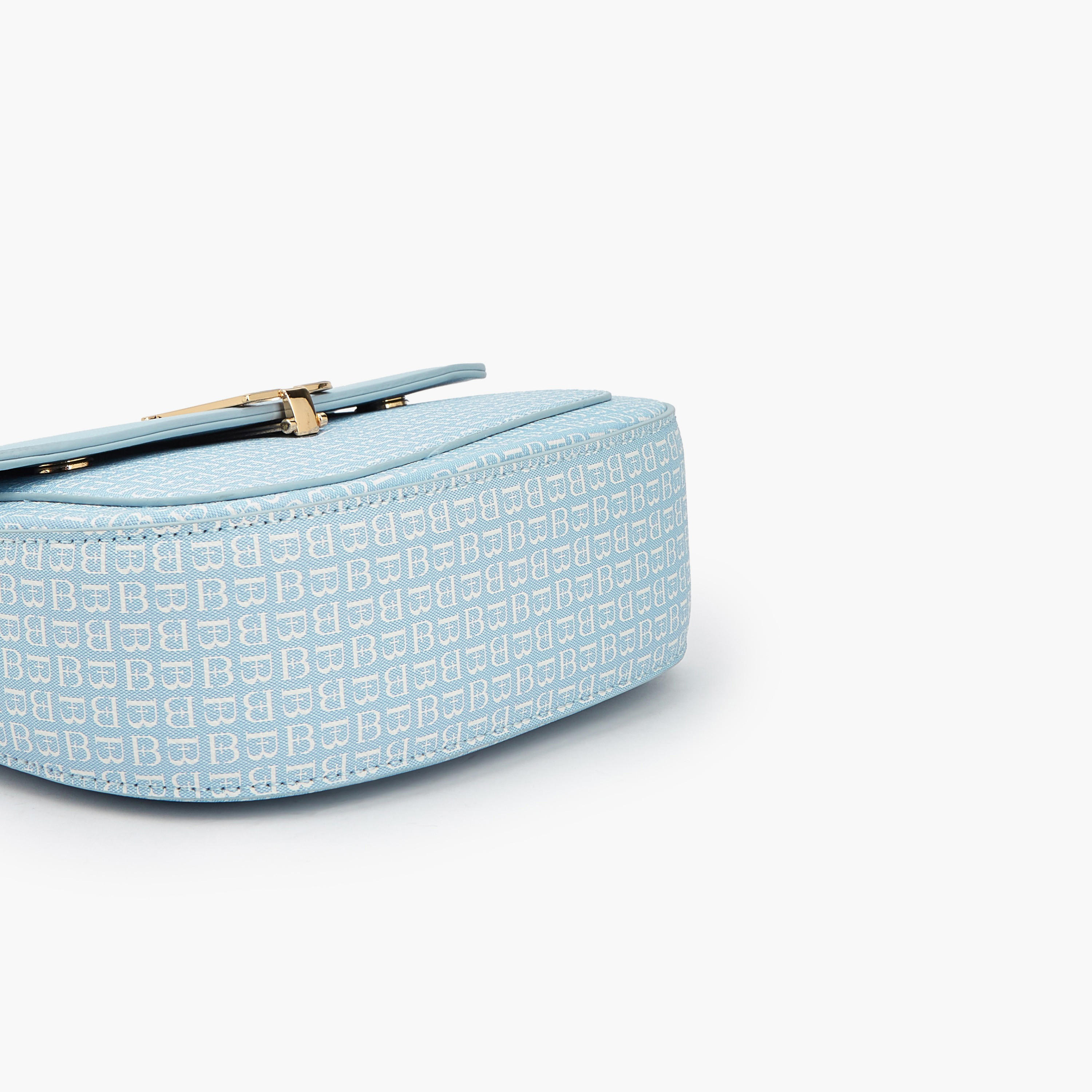 شنطة كتف بطبعات مونوجرام وطية من فلورا بيلا-women-bagsandwallets-handbags-image-7