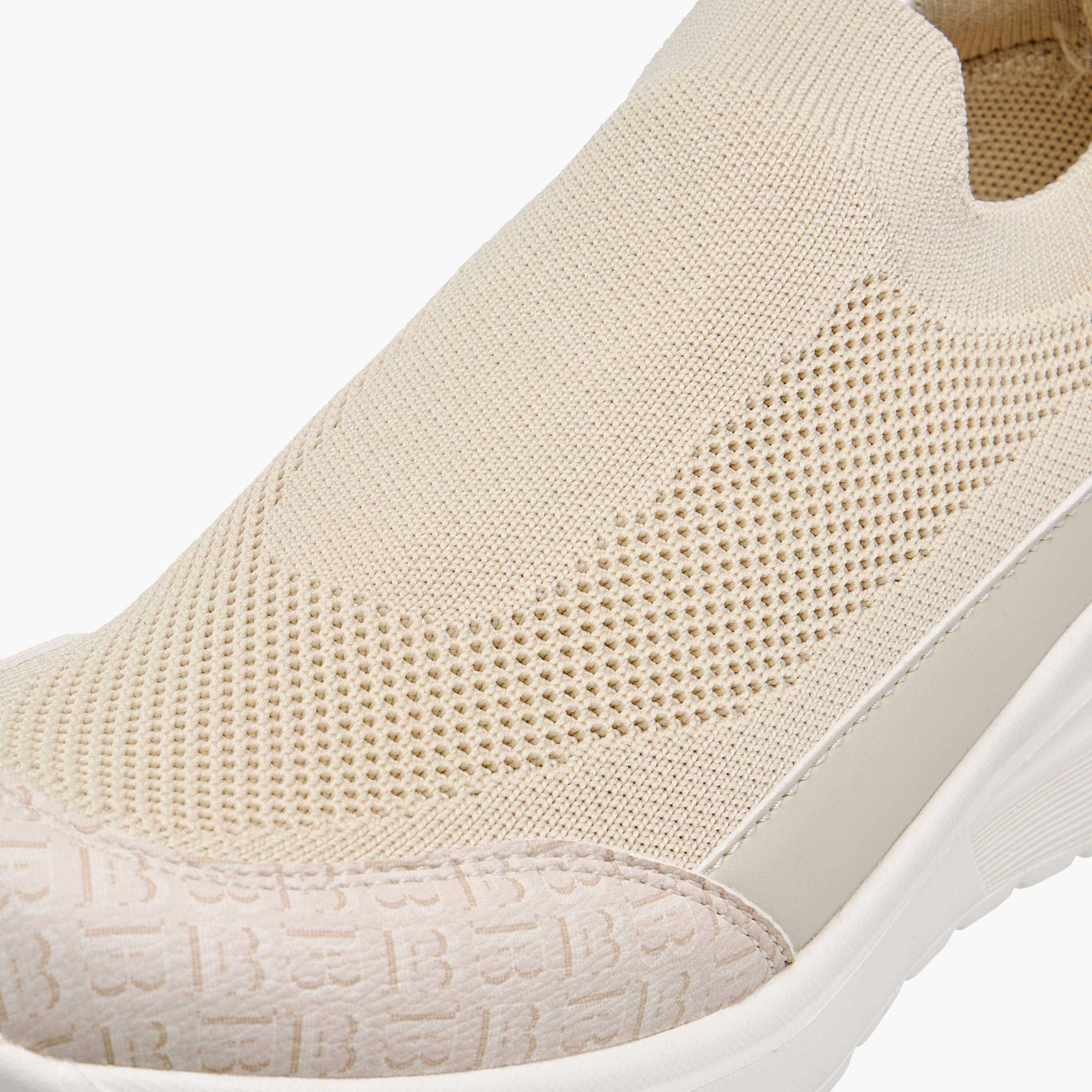 حذاء سنيكرز سهل الارتداء بارز الملمس بألسنة سحب من فلورا بيلا-women-shoes-sneakers-image-4