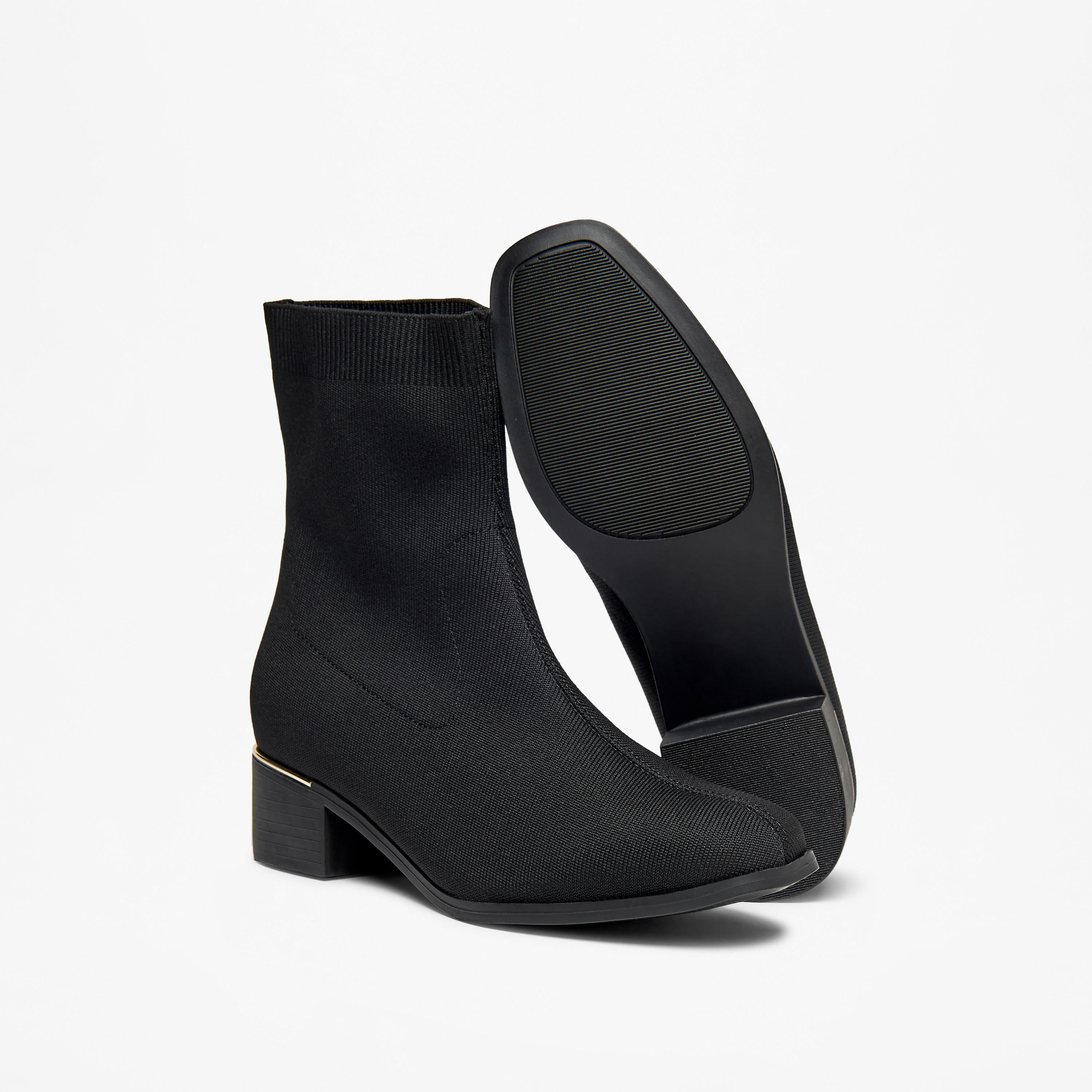بوت سادة سهل الارتداء بطول الكاحل وبكعب سميك من فلورا بيلا-women-shoes-boots-image-4