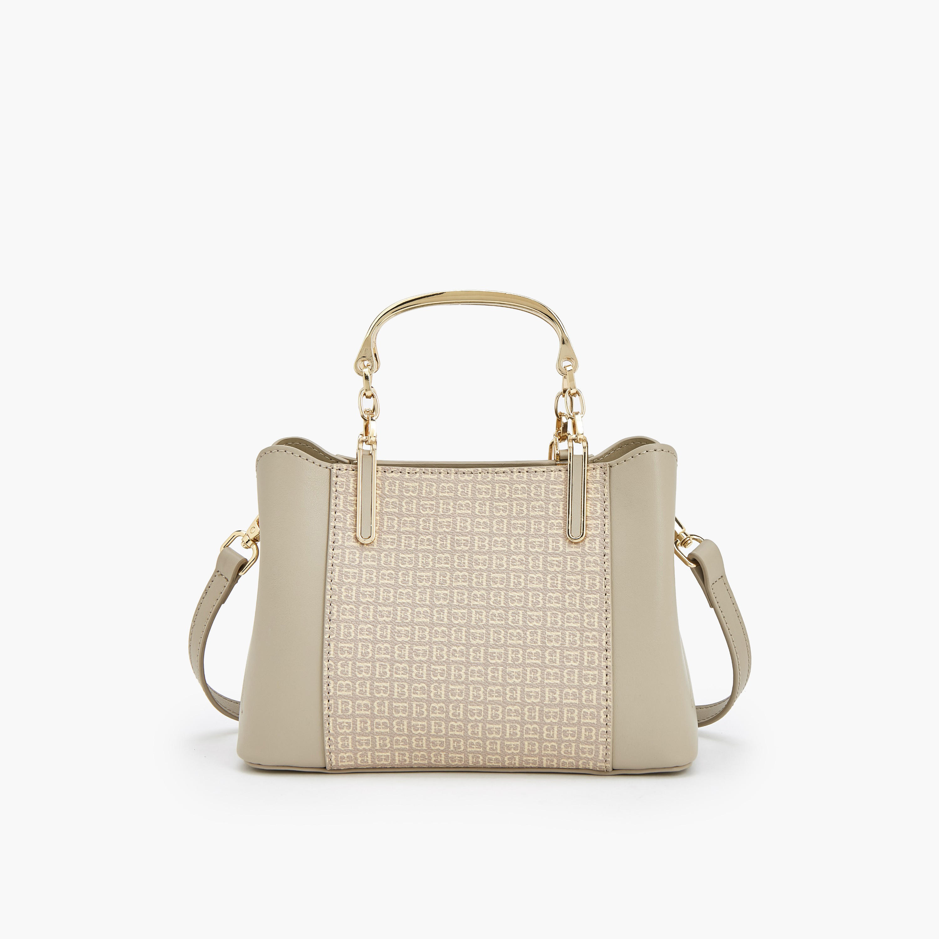شنطة توتي بطبعات مونوجرام ودلاية لؤلؤ من فلورا بيلا-women-bagsandwallets-handbags-image-4