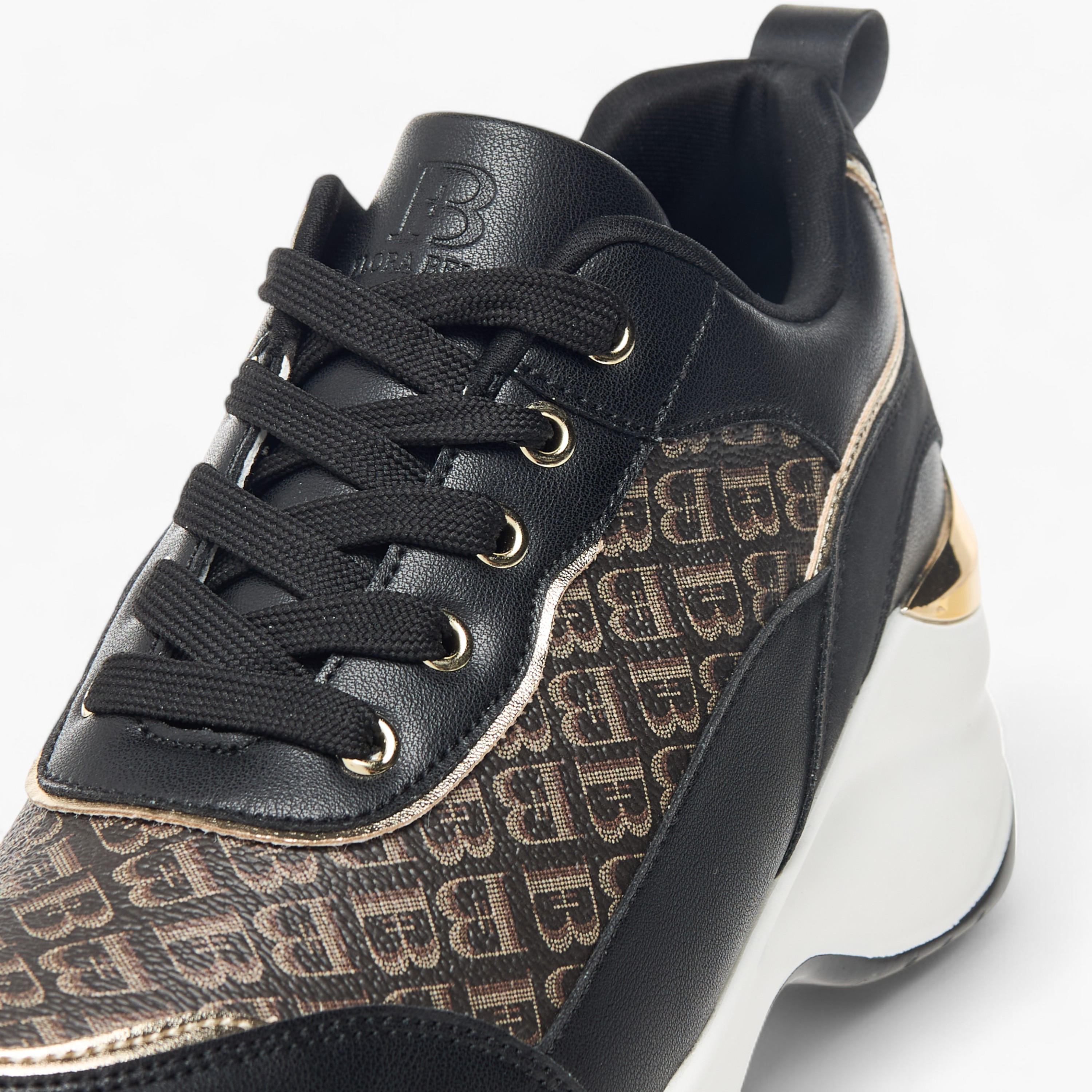 حذاء سنيكرز بارز الملمس بنمط مونوجرام ورباط إغلاق من فلورا بيلا-women-shoes-sneakers-image-4