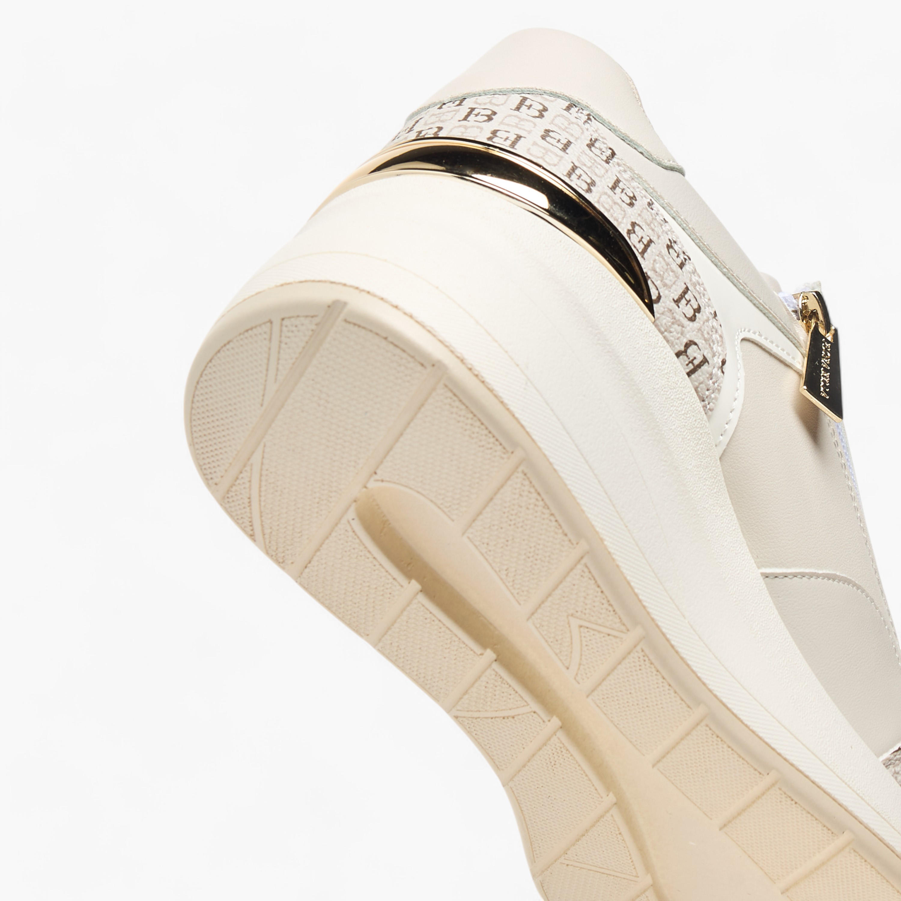 حذاء سنيكرز بطبعات مونوجرام ورباط إغلاق من فلورا بيلا-women-shoes-sneakers-image-5