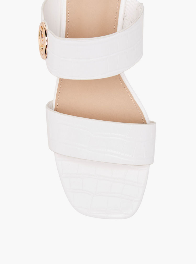 صندل سهل الارتداء بكعب سميك وزينة مونوجرام من فلورا بيلا-women-shoes-sandals-heeled-image-4