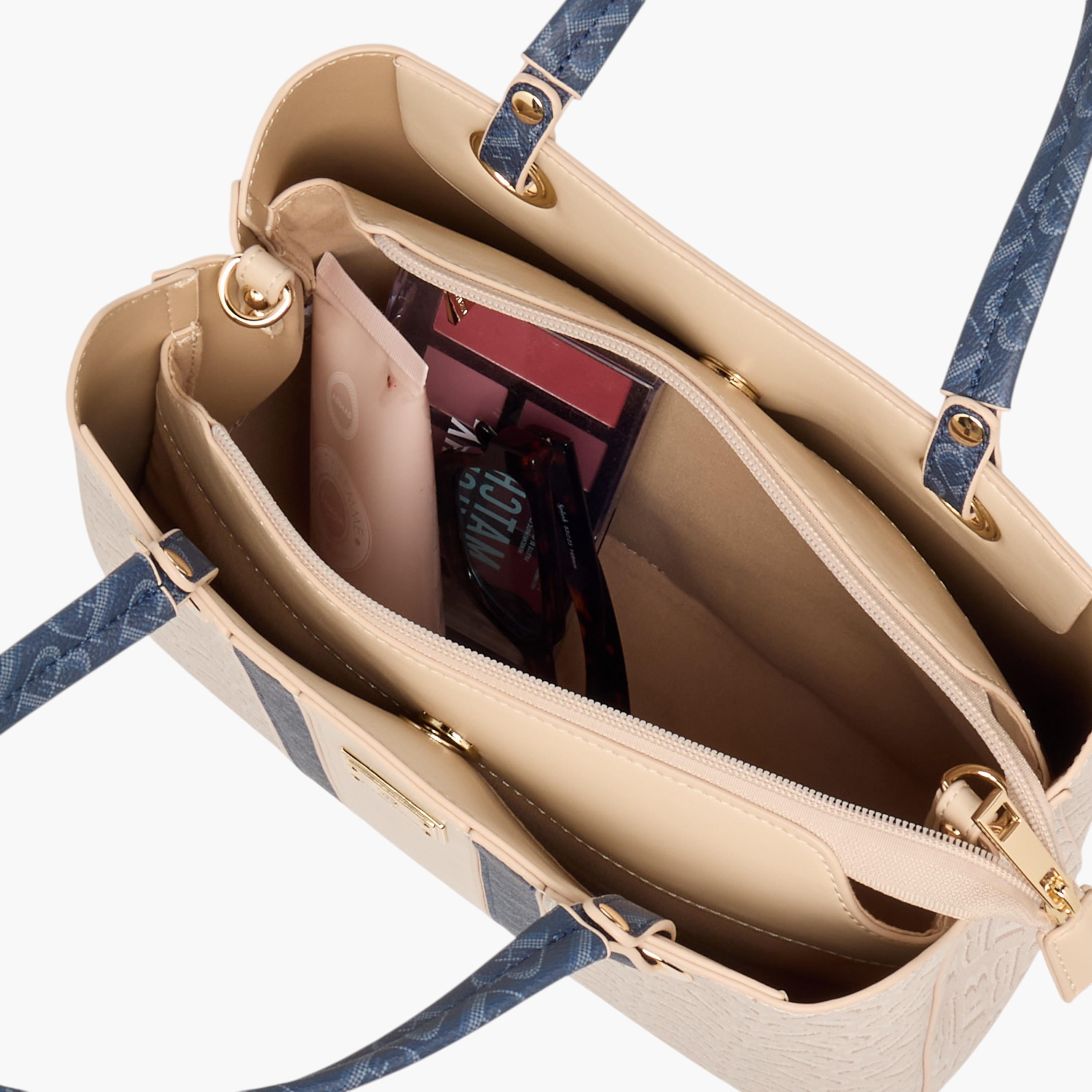 شنطة توتي بحزام قابل للفصل وطبعات مونوجرام من فلورا بيلا-women-bagsandwallets-handbags-image-6